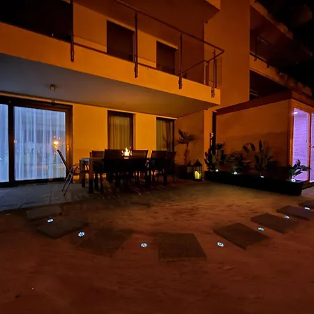 Апартаменты Karolina Lakefront Residence With Private Garden & Spa